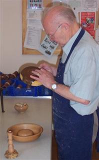 Reg Slack judging the entries for July